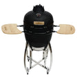 Black 18-inch Kamado BBQ grill with a textured ceramic body, stainless steel stand, and wooden side shelves for grilling convenience