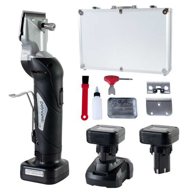 Cordless black horse clippers with ergonomic handle, two rechargeable batteries, and grooming accessories in a silver carrying case