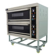 KuKoo large commercial pizza oven with two baking chambers, stainless steel finish, control panel, and sturdy wheeled base