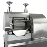 Stainless steel KuKoo sugar cane press with a sleek design, featuring a cylindrical crushing chamber and adjustable handles