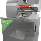 Stainless steel KuKoo sugar cane press with a sleek design, featuring a safety warning label and a sturdy feed tray for easy operation
