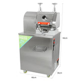Stainless steel KuKoo sugar cane press with a sleek design, featuring a large feeding area and safety warning labels, dimensions 94cm x 46cm x 36cm