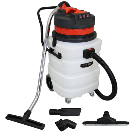 90L Maxblast industrial vacuum with a black and orange top, large white tank, flexible hose, and multiple attachments for wet and dry cleaning