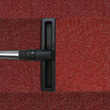 Black nozzle of a 90L Maxblast industrial vacuum on a textured red carpet, showcasing its wet and dry cleaning capabilities