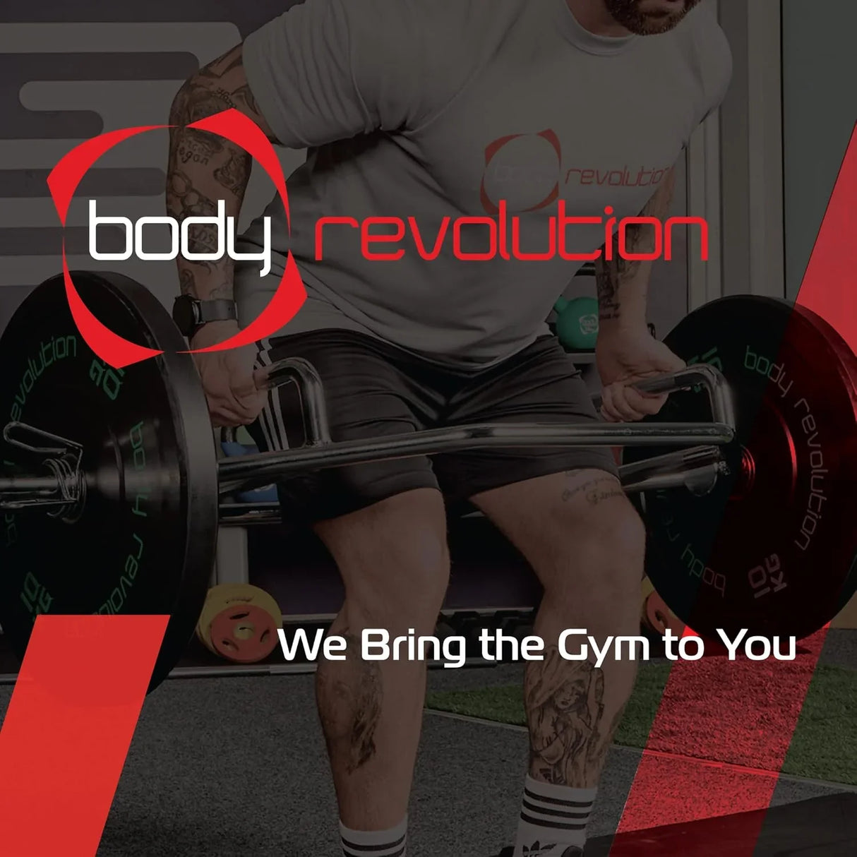 Muscular individual lifting a Body Revolution 4ft barbell bar with black weight plates, showcasing strength training in a gym setting