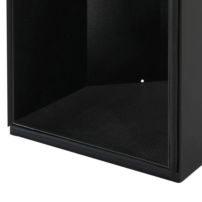 Sleek black storage cabinet interior featuring a textured ribbed floor and smooth walls, ideal for organizing items efficiently