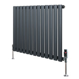 Oval single column radiator in anthracite grey, featuring sleek vertical tubes and stylish valves, ideal for modern interiors