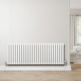 Oval single column radiator in white, 600mm x 1620mm, featuring sleek vertical bars and chrome valves, set against a light wall