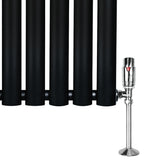Sleek black oval single column radiator with polished chrome valves, measuring 1600mm x 360mm, ideal for modern interiors