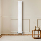 White oval single column radiator, 1800mm x 240mm, with sleek vertical design, mounted on a wall in a modern living space