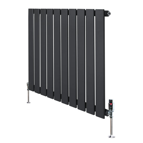 Flat single column radiator in anthracite grey, featuring sleek vertical panels and chrome valves, ideal for modern interiors