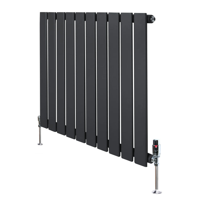 Flat single column radiator in anthracite grey, featuring sleek vertical panels and chrome valves, ideal for modern interiors