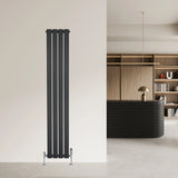 Flat single column radiator in anthracite grey, 1600mm x 280mm, featuring sleek vertical lines and modern valves against a minimalist interior backdrop