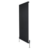 Flat single column radiator in sleek black finish, measuring 1600mm x 700mm, with modern valves and vertical design for stylish heating