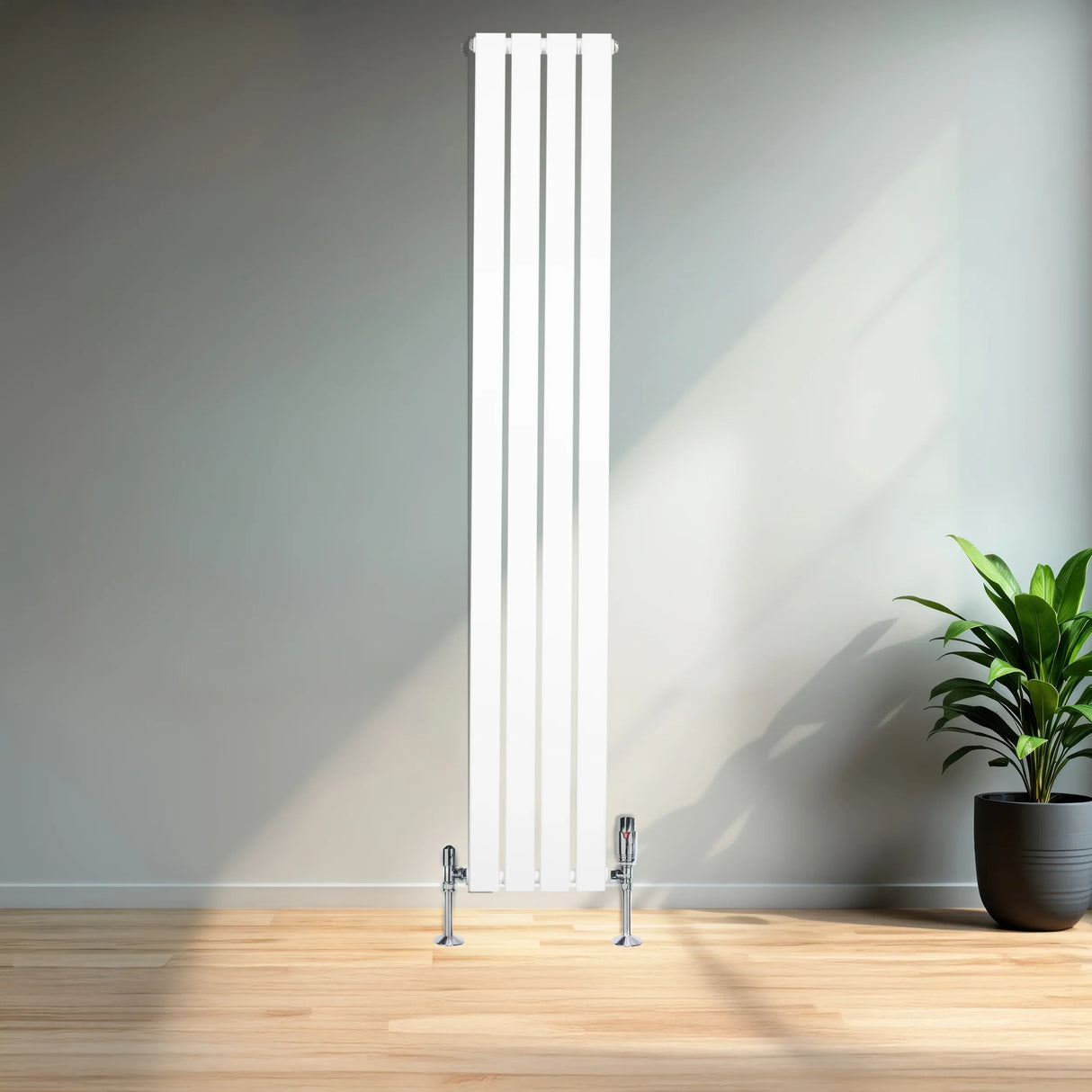 Flat single column radiator in white, 1800mm x 280mm, featuring sleek vertical panels and chrome valves, set against a modern interior with a potted plant