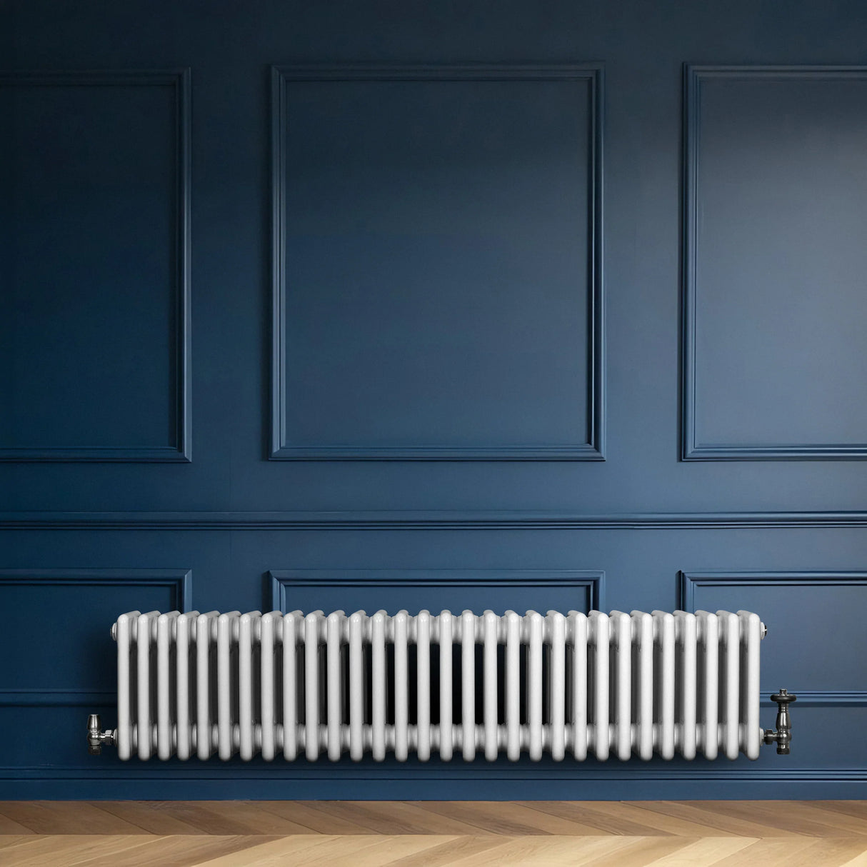 Traditional white 4 column radiator, 300 x 1370mm, installed against a deep blue wall, showcasing a sleek, modern design and smooth finish