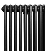 Traditional black 4 column radiator featuring smooth, glossy finish and rounded edges, designed for efficient heating in any space