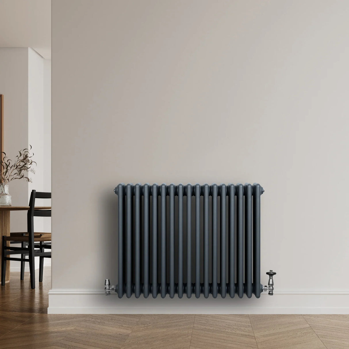 Traditional anthracite grey 4 column radiator, 600 x 785mm, featuring a sleek design and smooth, textured finish, mounted on a wall