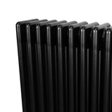 Traditional 4 column radiator in sleek black finish, featuring smooth, rounded edges and a modern design, measuring 600 x 1010mm