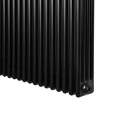 Traditional 4 column radiator in sleek black finish, featuring a smooth texture and compact design, measuring 600 x 1010mm