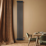 Traditional 4 column radiator in anthracite grey, sleek vertical design against a warm wall, enhancing modern interior decor