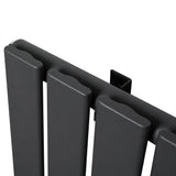 Flat single column radiator in anthracite grey, featuring a sleek, modern design with smooth, flat panels and a matte finish