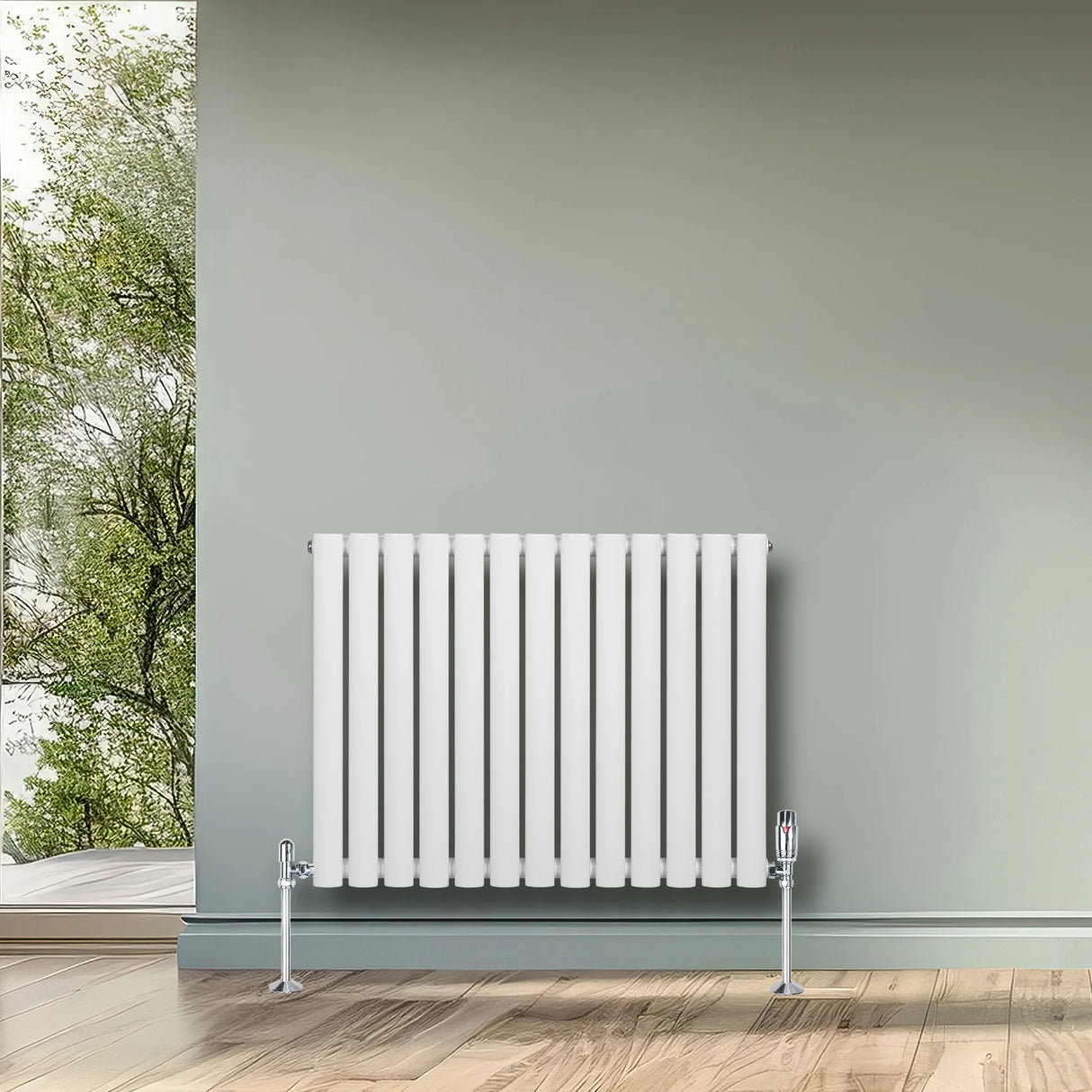 White oval single column radiator, 600 x 780mm, featuring sleek vertical lines and chrome valves, set against a soft green wall