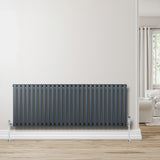 Anthracite grey oval single column radiator, 600 x 1620mm, featuring sleek vertical lines and a modern design, mounted on a white wall