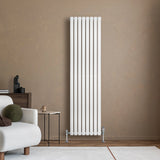 Sleek white oval single column radiator, 1800 x 480mm, mounted on a textured beige wall, complementing modern home decor