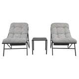 Stylish 3 piece bistro set featuring two grey cushioned chairs and a sleek black metal side table, perfect for outdoor relaxation