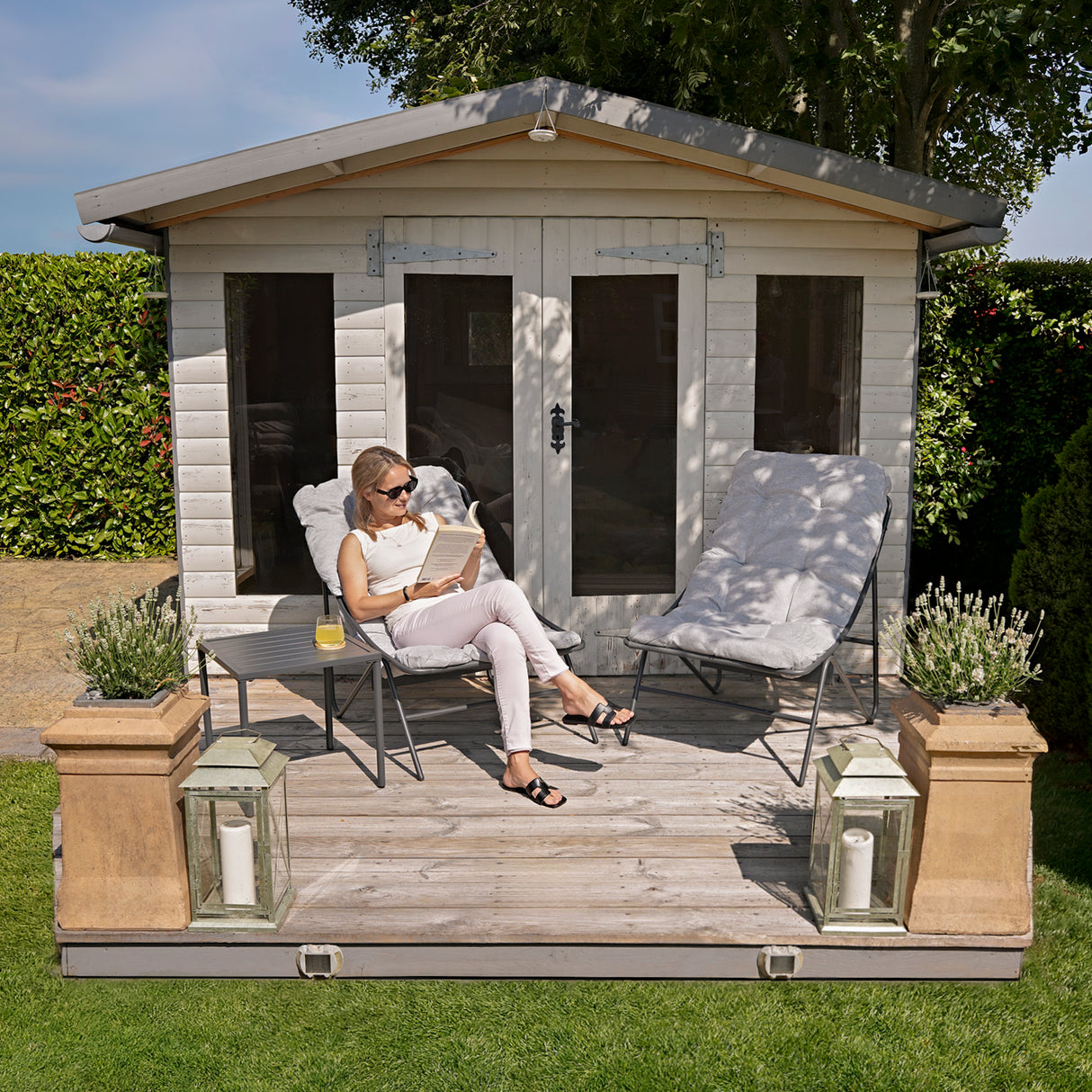 Stylish grey 3-piece bistro set featuring a sleek table and two comfortable chairs, perfect for outdoor relaxation and dining