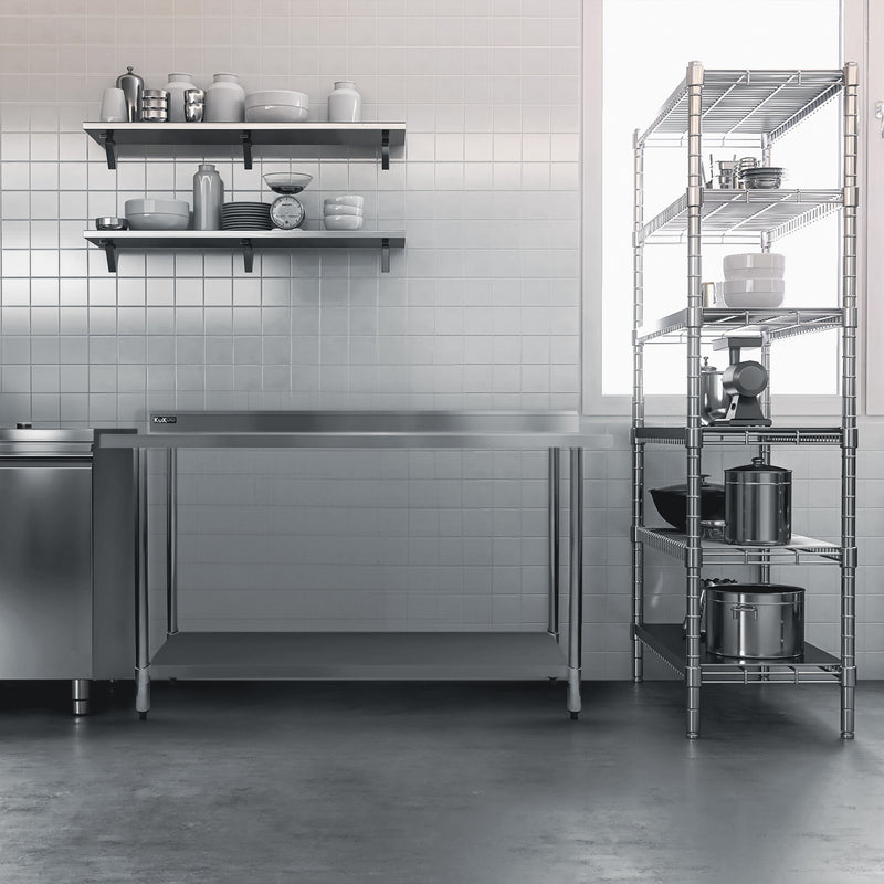 Modern stainless steel kitchen workspace with open shelves, neatly arranged dishes, and a sleek metal storage rack against a tiled wall