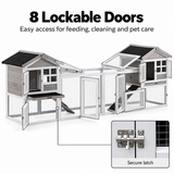 Grey 2-in-1 outdoor rabbit hutch featuring eight lockable doors, mesh panels for ventilation, and a secure latch for safety