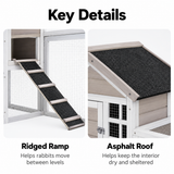 Grey 2-in-1 outdoor rabbit hutch featuring a ridged ramp for easy access and a textured asphalt roof for weather protection
