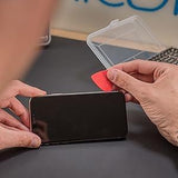 Hands using a red plastic prying tool on a smartphone screen, showcasing the ilabPRO 120 Piece Precision Screwdriver Set in action